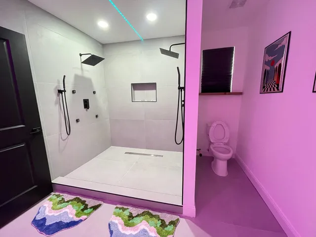 a kitchen with a refrigerator and a sink