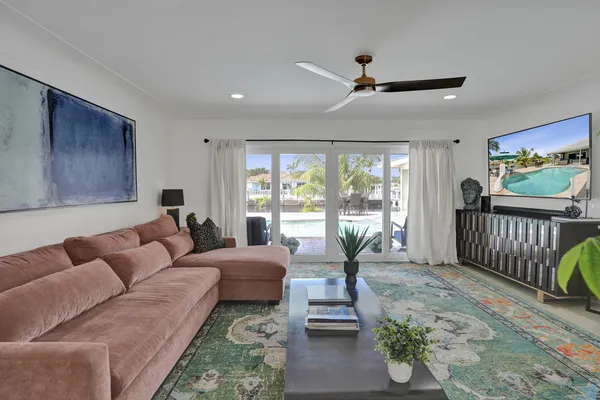 a view of a dining room with furniture and a livingroom