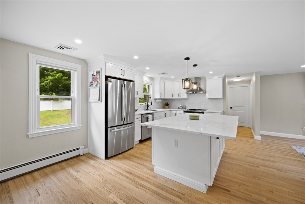 24 Francis Road Sharon, MA 02067 - Photo 15 of 41 a kitchen with stainless steel appliances a refrigerator sink and cabinets