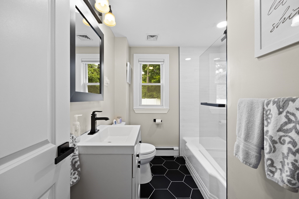 24 Francis Road Sharon, MA 02067 - Photo 22 of 41 a bathroom with a sink toilet and shower