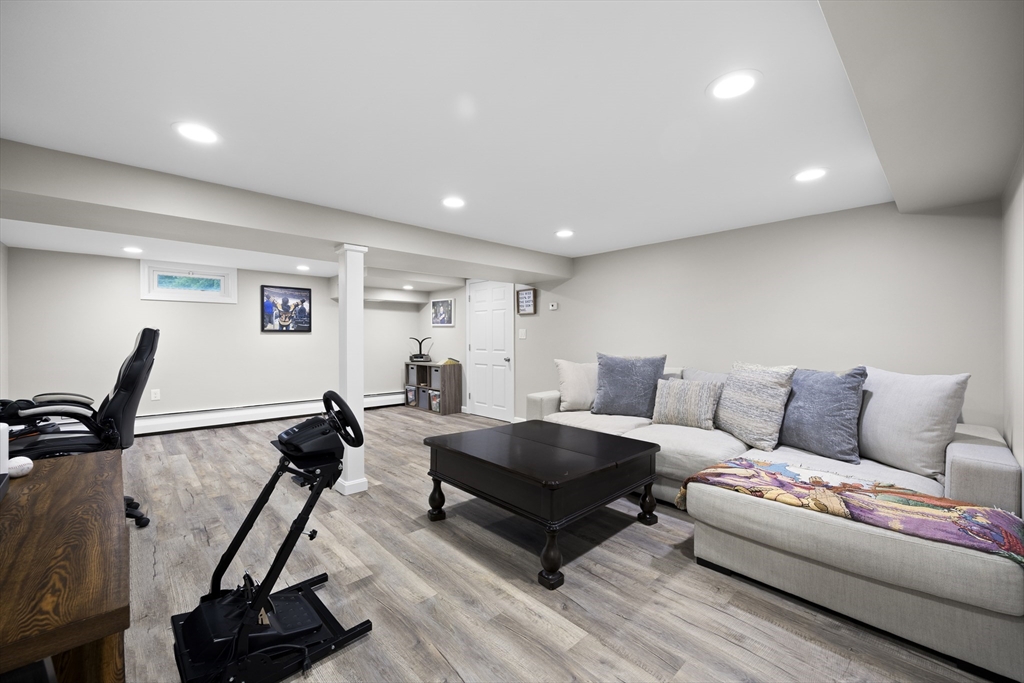24 Francis Road Sharon, MA 02067 - Photo 29 of 41 a living room with furniture and a window