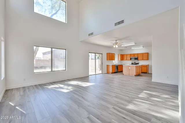 a view of a living room and wooden floor
