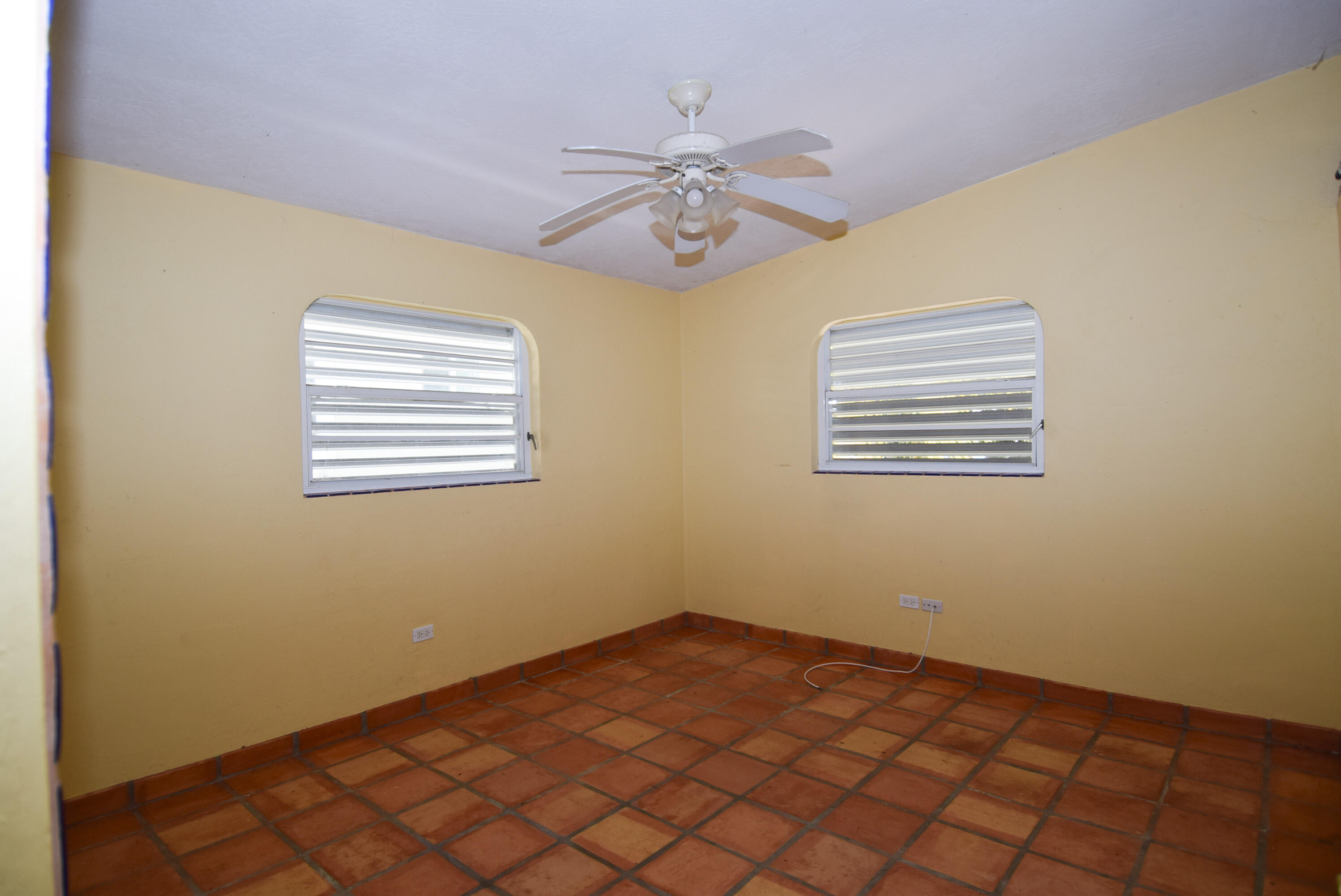 60 Southeast Marlin Avenue Key Largo, FL 33037 - Photo 18 of 46 a view of an empty room with a window