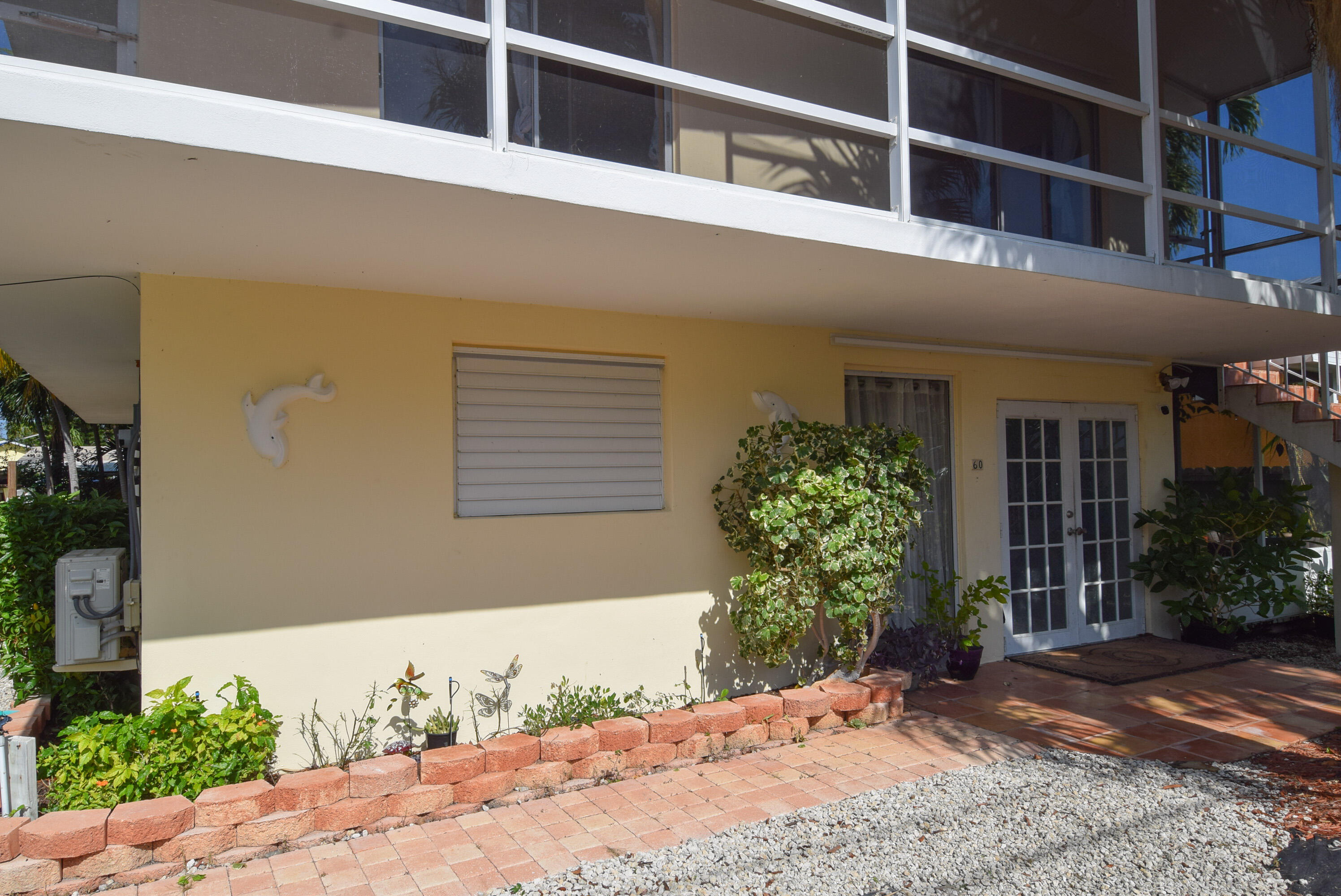 60 Southeast Marlin Avenue Key Largo, FL 33037 - Photo 25 of 46 a front view of a house