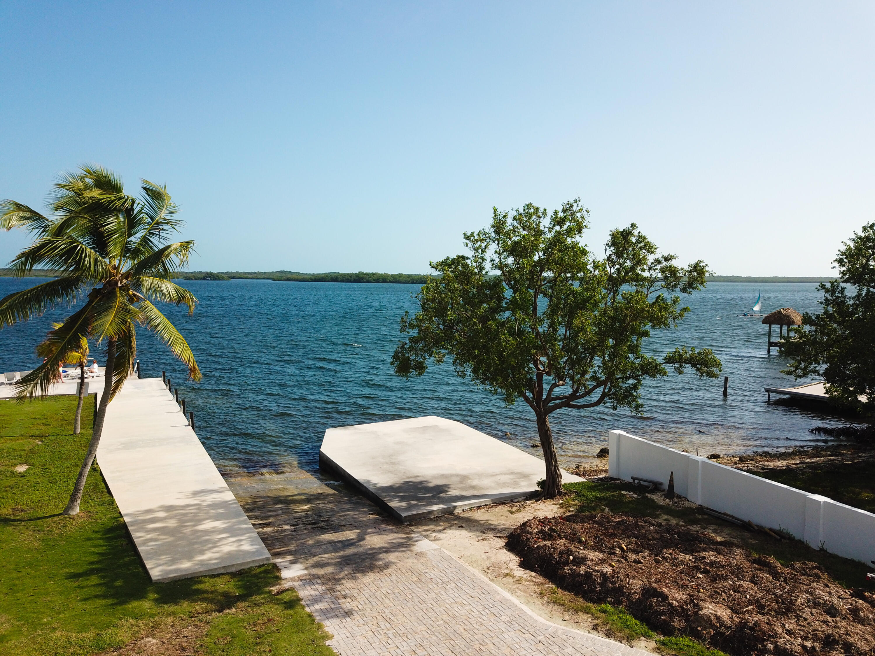 60 Southeast Marlin Avenue Key Largo, FL 33037 - Photo 27 of 46 a view of a backyard with chairs