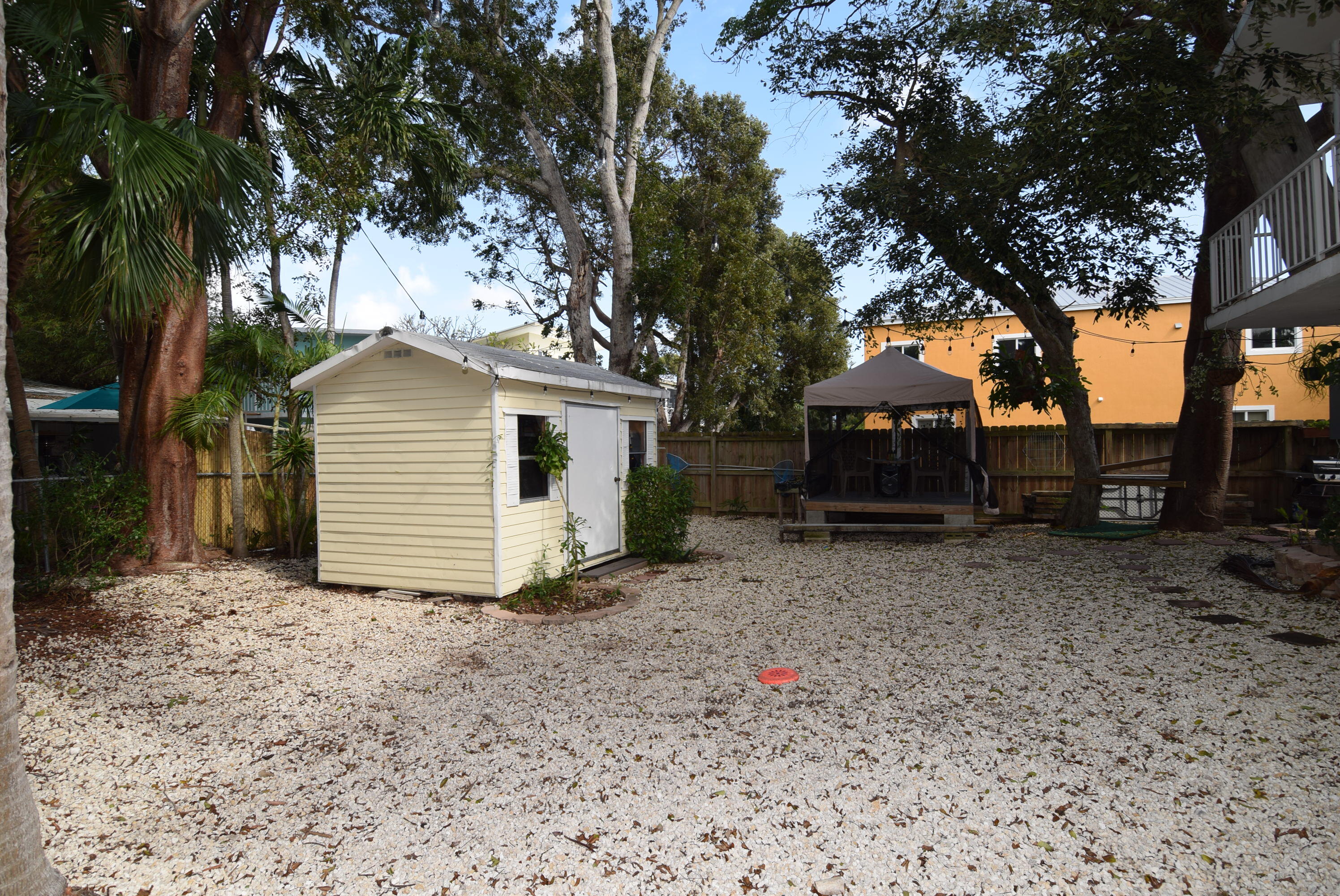 60 Southeast Marlin Avenue Key Largo, FL 33037 - Photo 29 of 46 a view of a house with a yard and tree s
