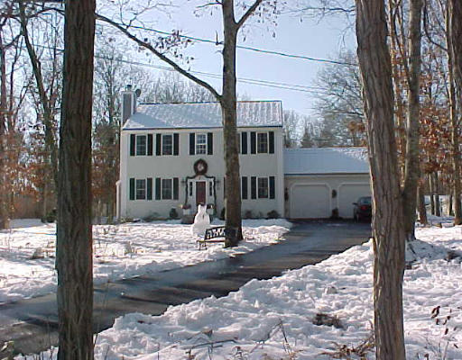 30 Crowell Road Bourne, MA 02562 - Photo 1 of 1 a view of a house with snow on the road