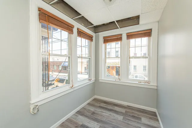 an empty room with windows