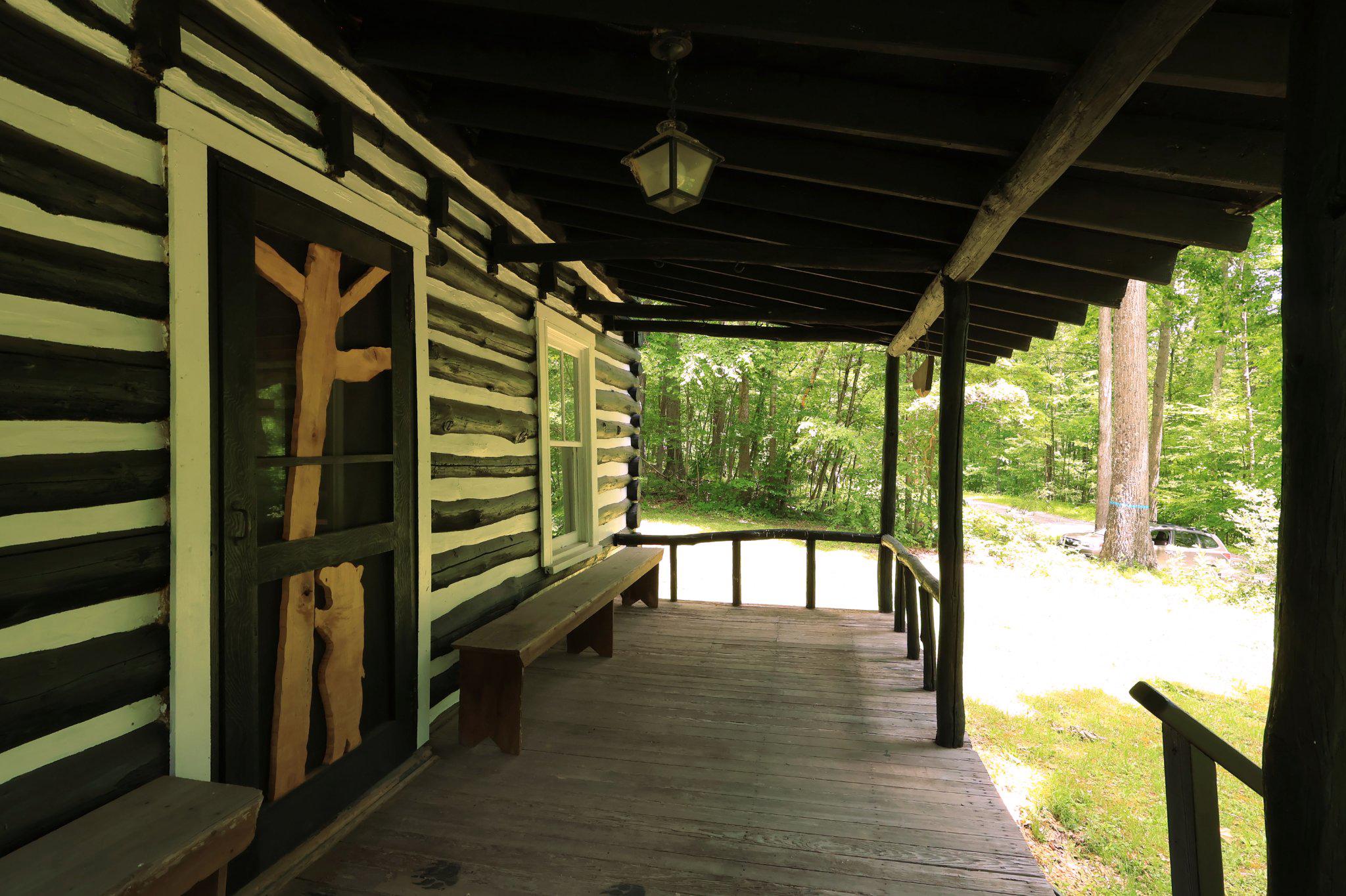 4464 Tram Road Spruce Creek, PA 16683 - Photo 8 of 53 a view of outdoor space with wooden floor and windows