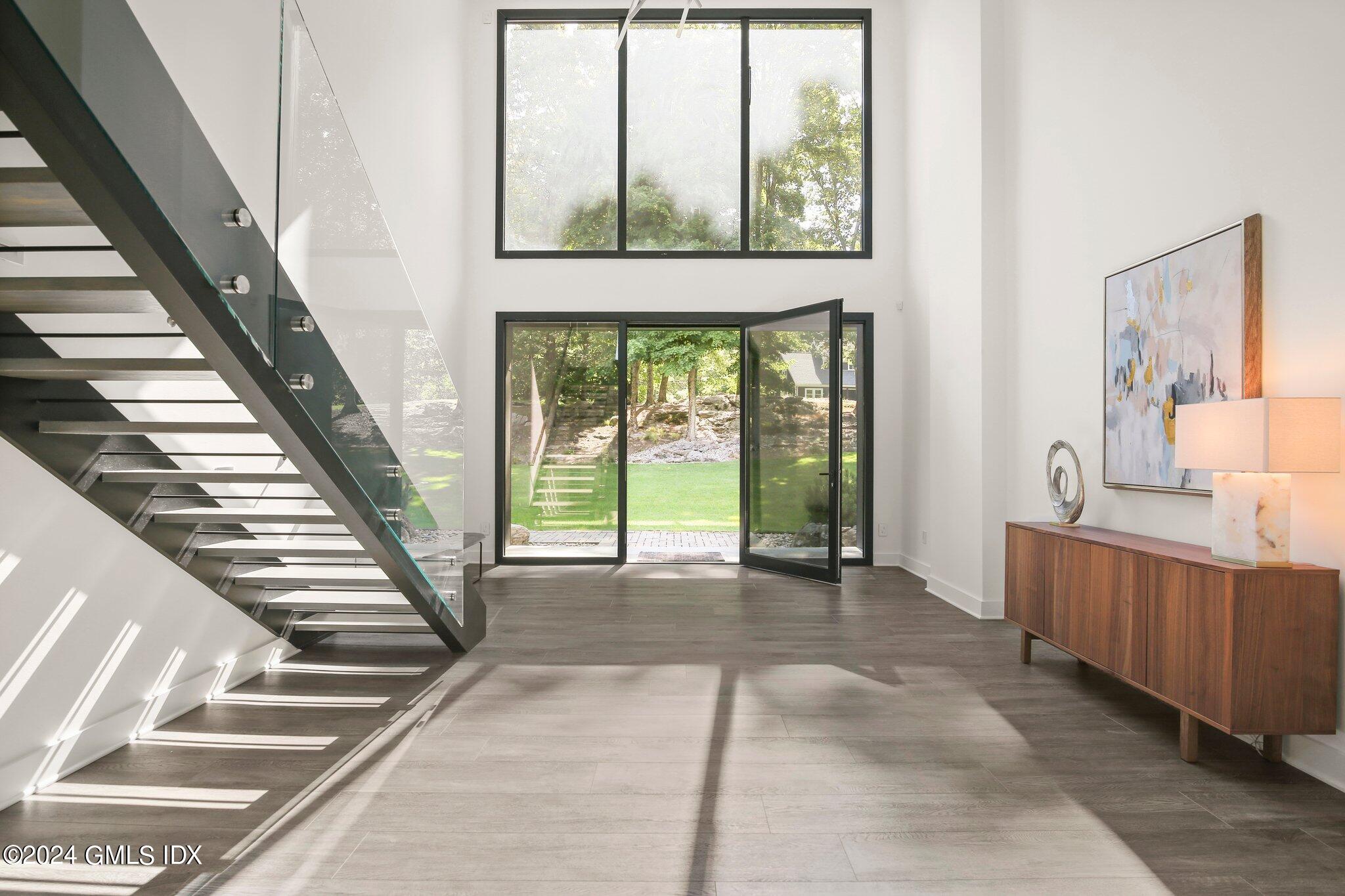 50 Sumner Road Greenwich, CT 06831 - Photo 3 of 69 a view of an entryway with staircase