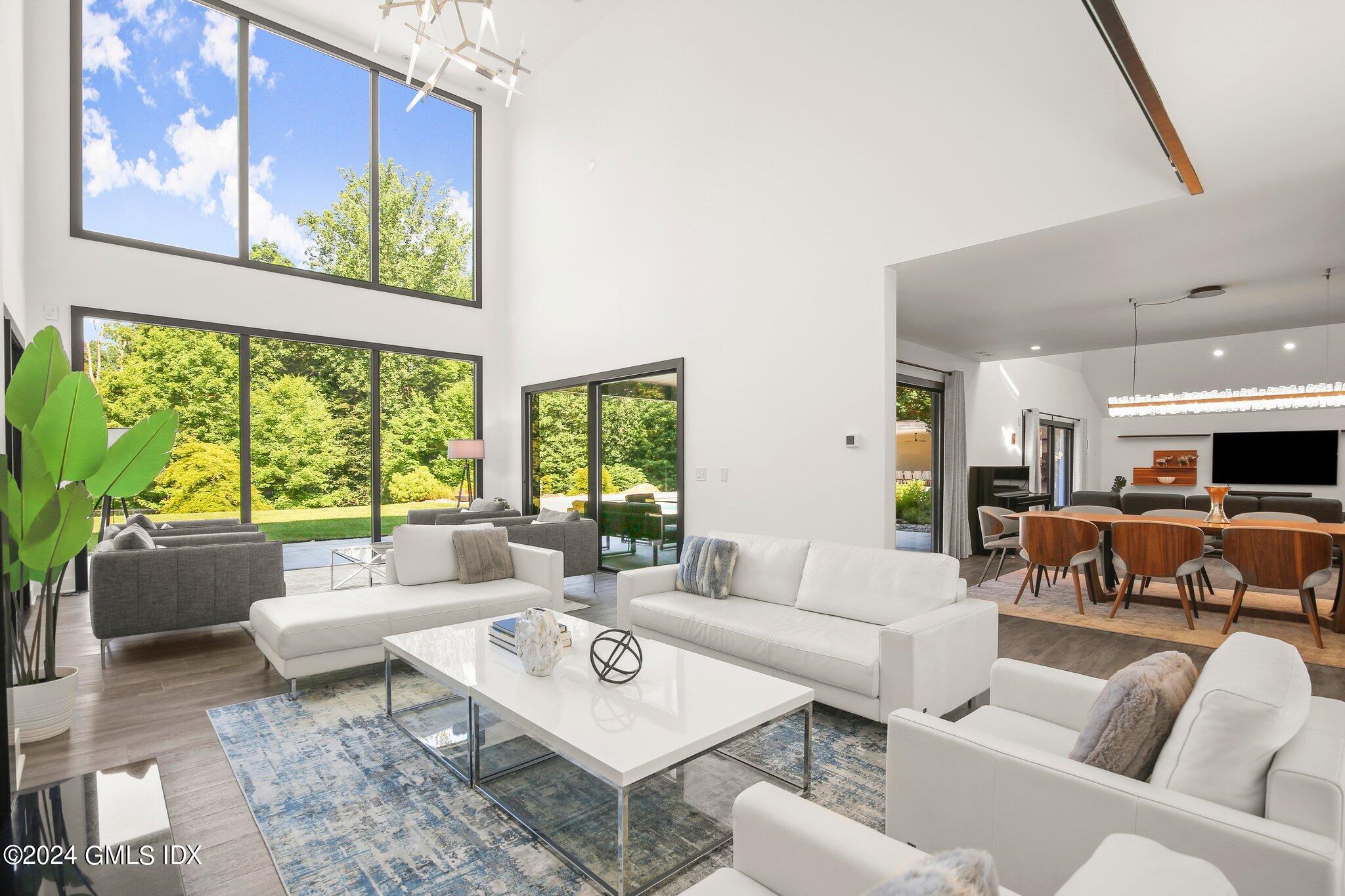 50 Sumner Road Greenwich, CT 06831 - Photo 4 of 69 a living room with furniture and a large window