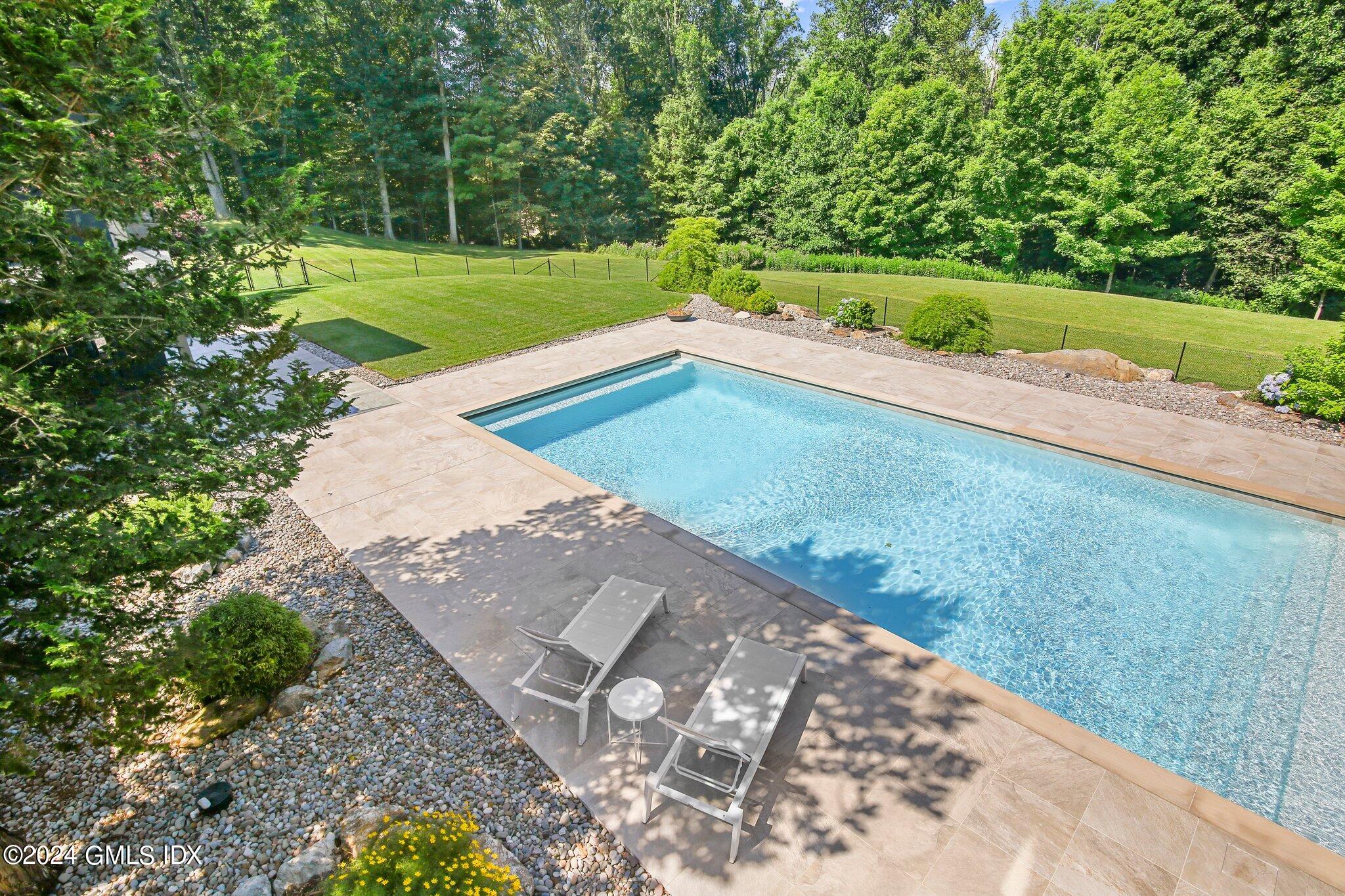 50 Sumner Road Greenwich, CT 06831 - Photo 43 of 69 a view of a golf course with a park