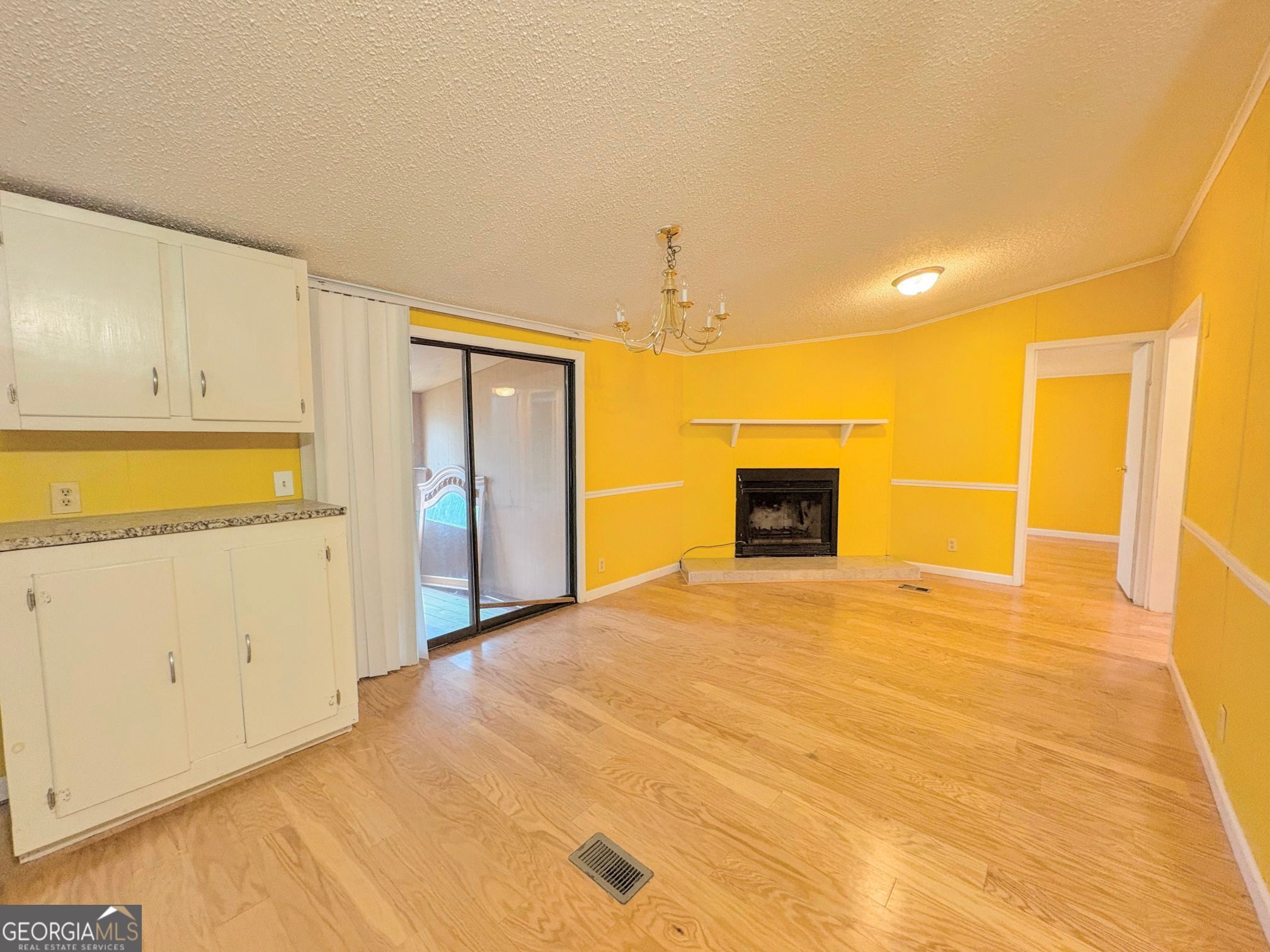 319 Wages Road Auburn, GA 30011 - Photo 8 of 26 a view of a livingroom with a fireplace