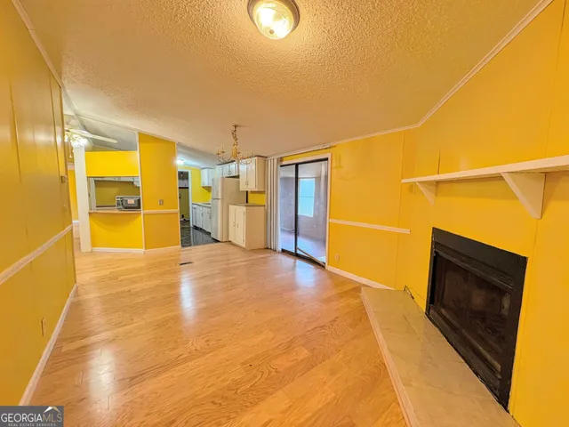 a view of empty room with a patio