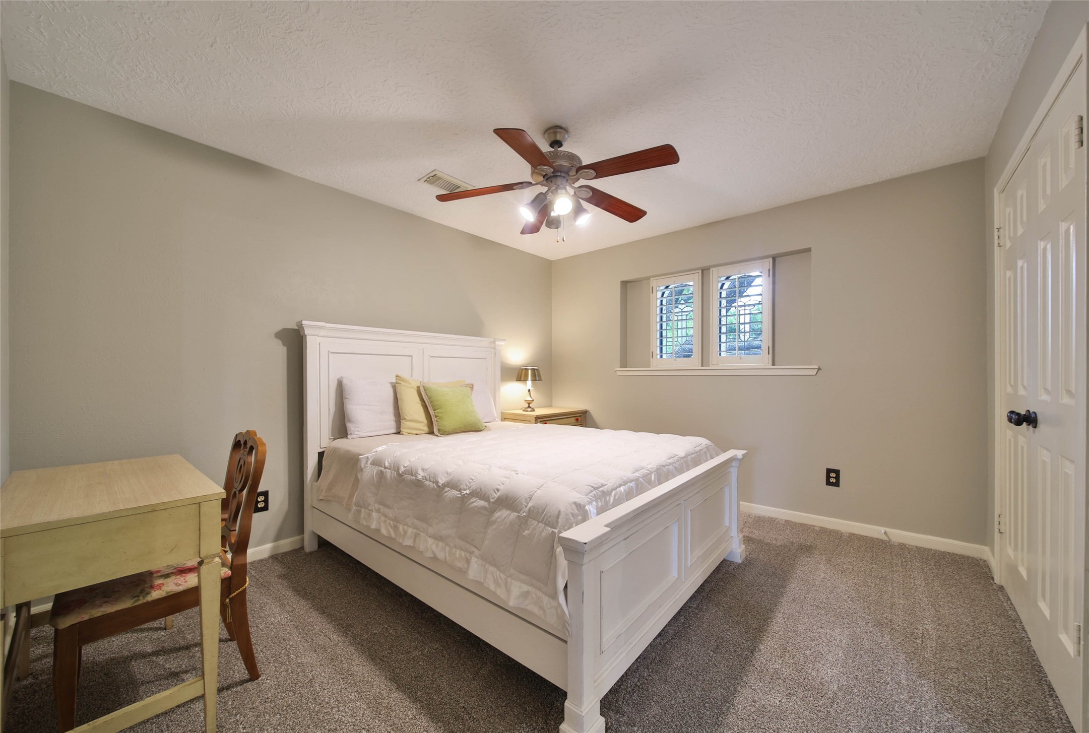 17007 Windrow Drive Spring, TX 77379 - Photo 34 of 46 a bedroom with a bed and a chair