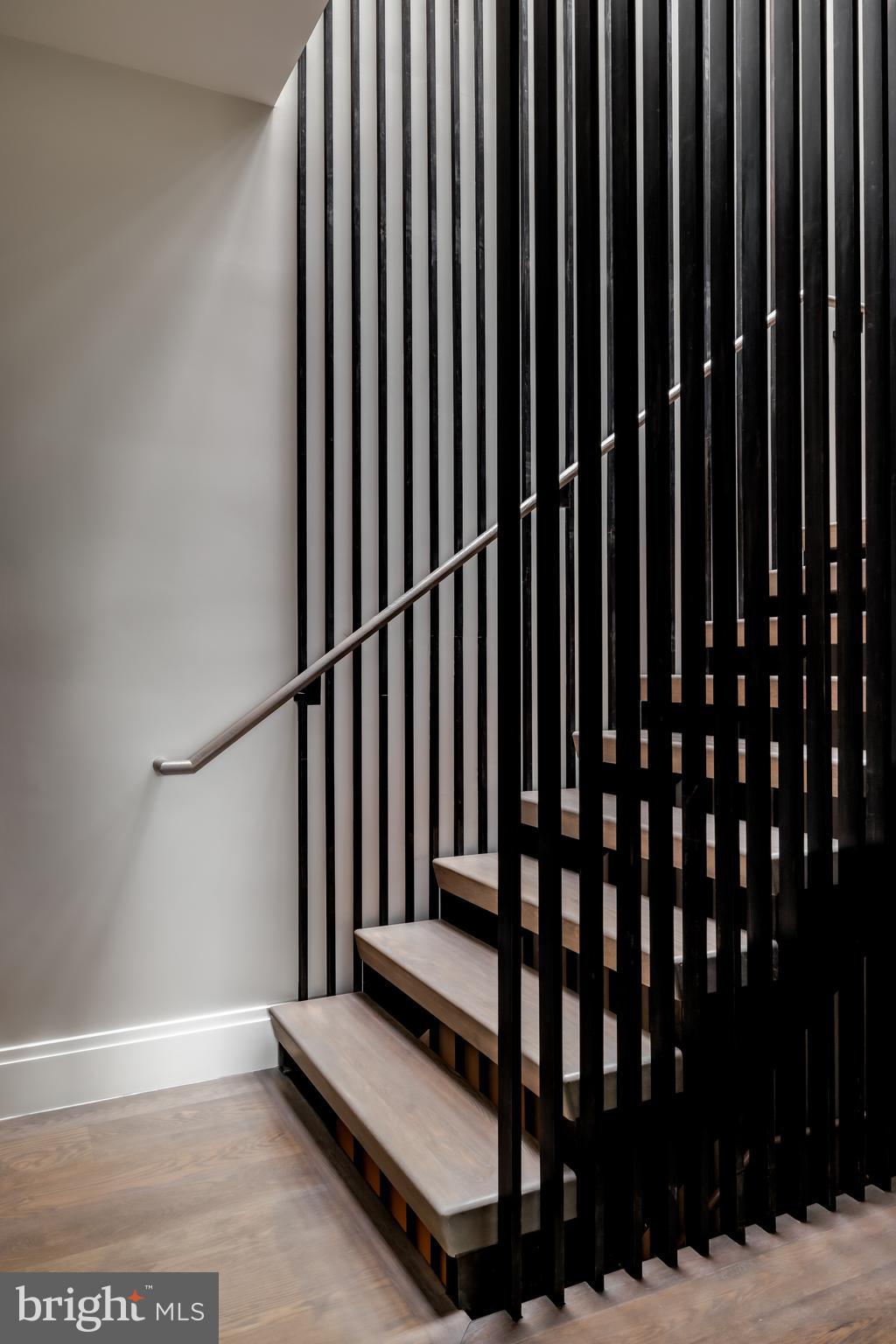 3240 Prospect Street Northwest Washington, DC 20007 - Photo 38 of 50 Floating staircase with metal panels