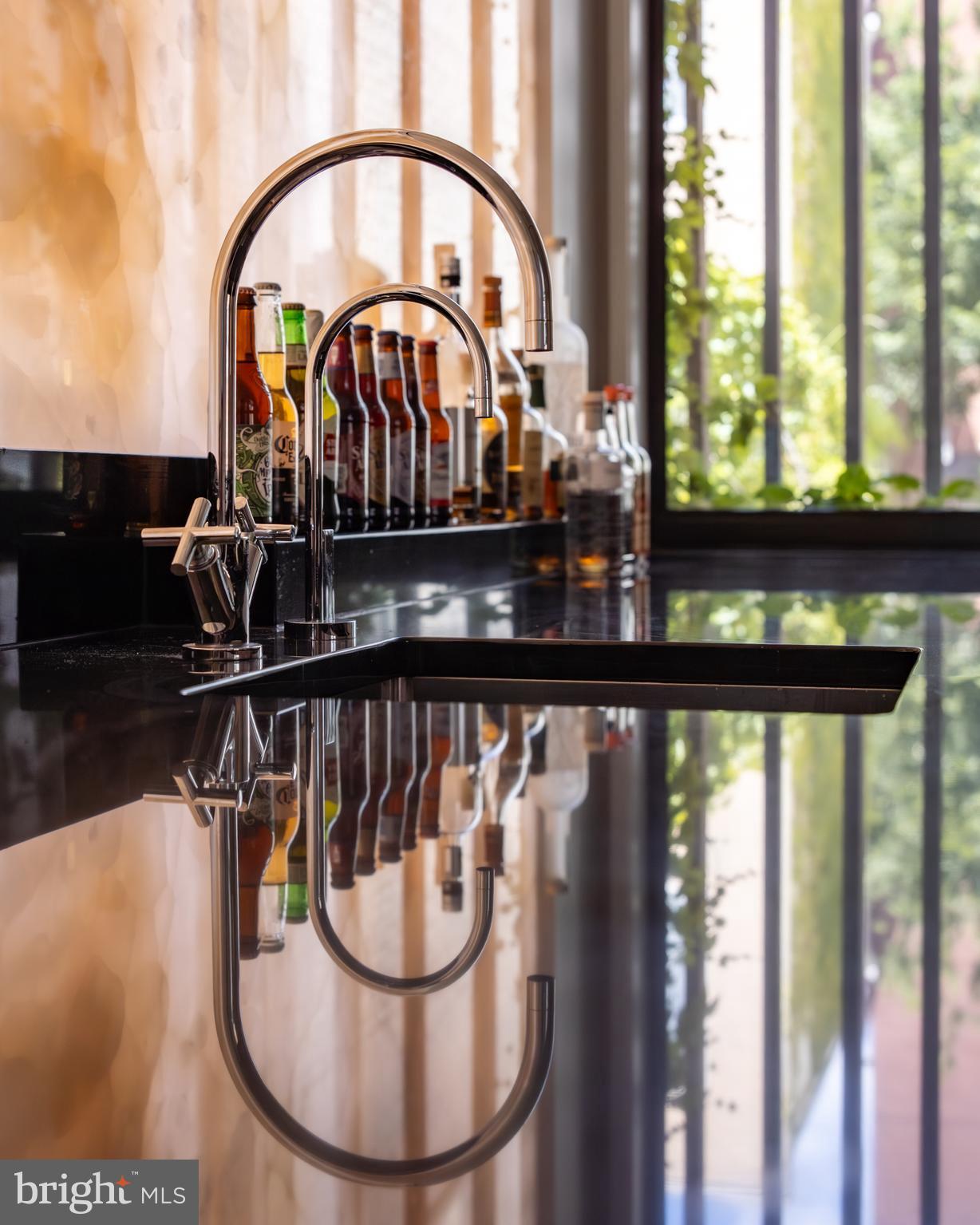 3240 Prospect Street Northwest Washington, DC 20007 - Photo 10 of 50 Polished granite tiered countertop with sink