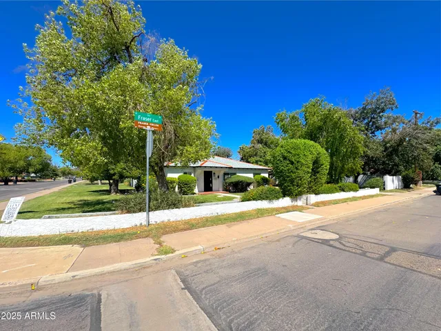 a house with a tree in front of it