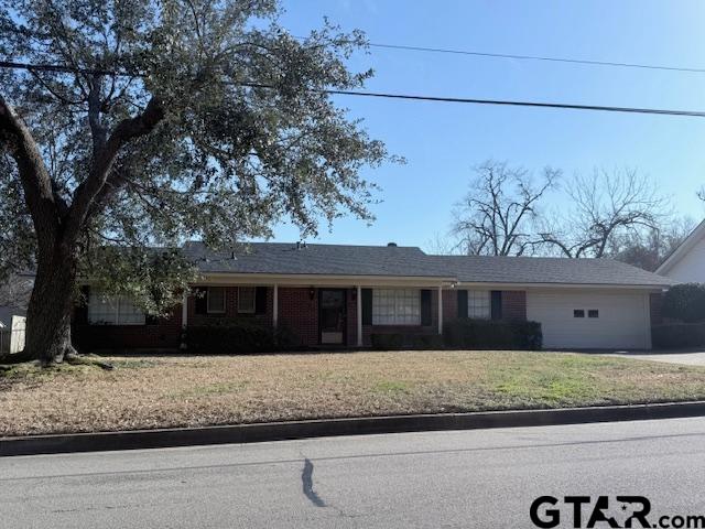 534 Fair Lane Tyler, TX 75701 - Photo 1 of 30 a front view of a house with a yard