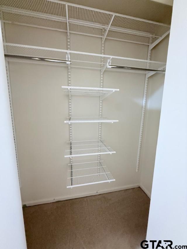 534 Fair Lane Tyler, TX 75701 - Photo 19 of 30 a view of an empty walk in closet