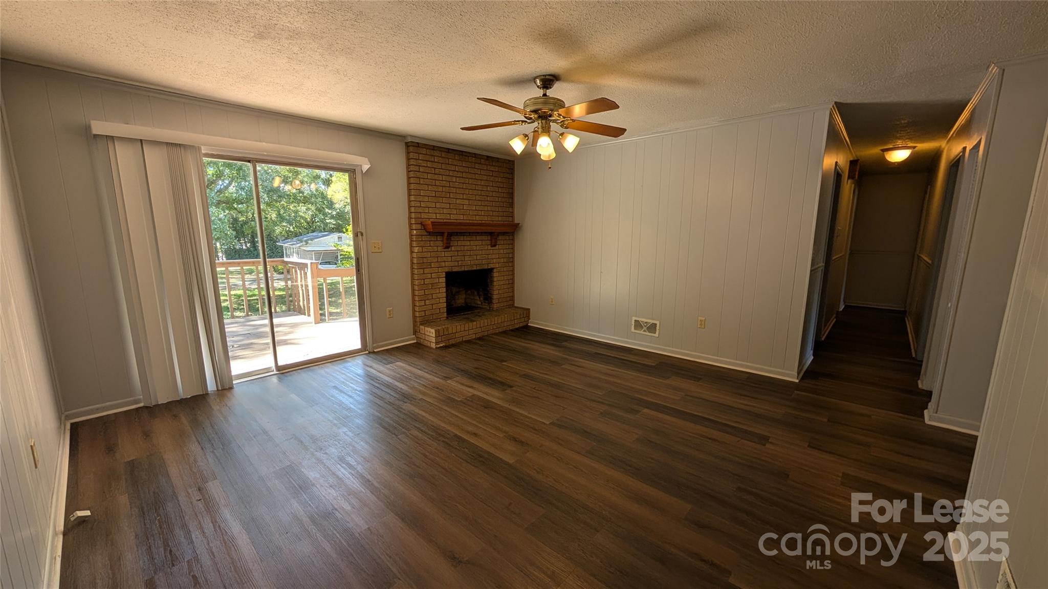 3889 Poplar Tent Road Concord, NC 28027 - Photo 12 of 33 wooden floor in an empty room with a window