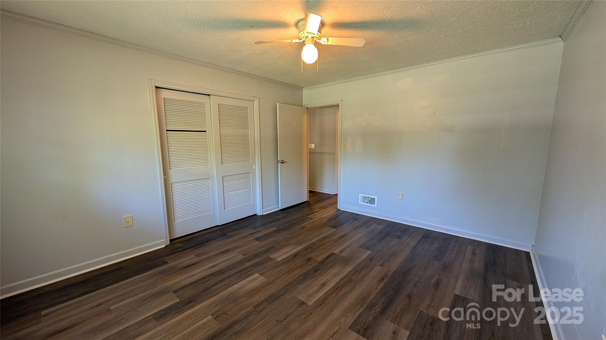 3889 Poplar Tent Road Concord, NC 28027 - Photo 18 of 33 wooden floor in an empty room