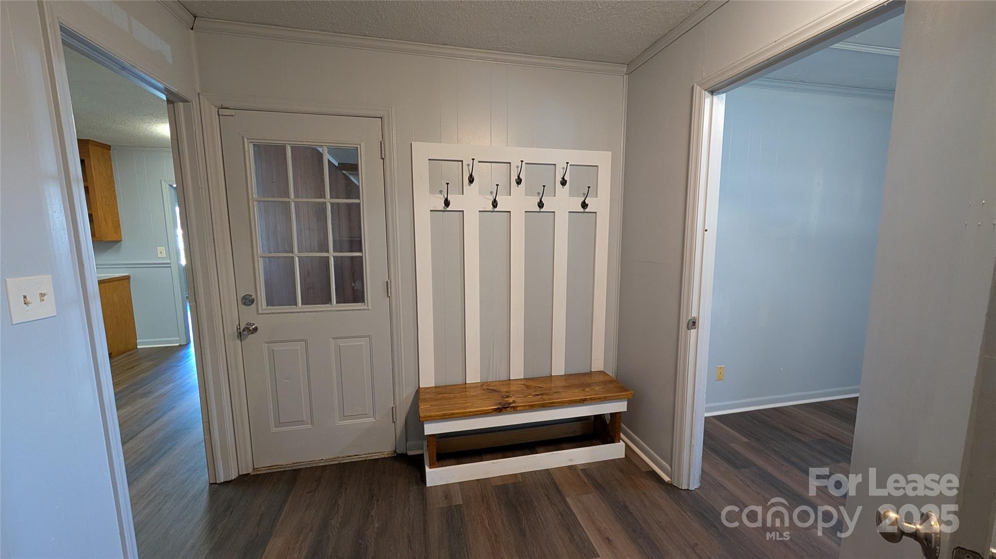 3889 Poplar Tent Road Concord, NC 28027 - Photo 26 of 33 a view of a room with wooden floor and stairs