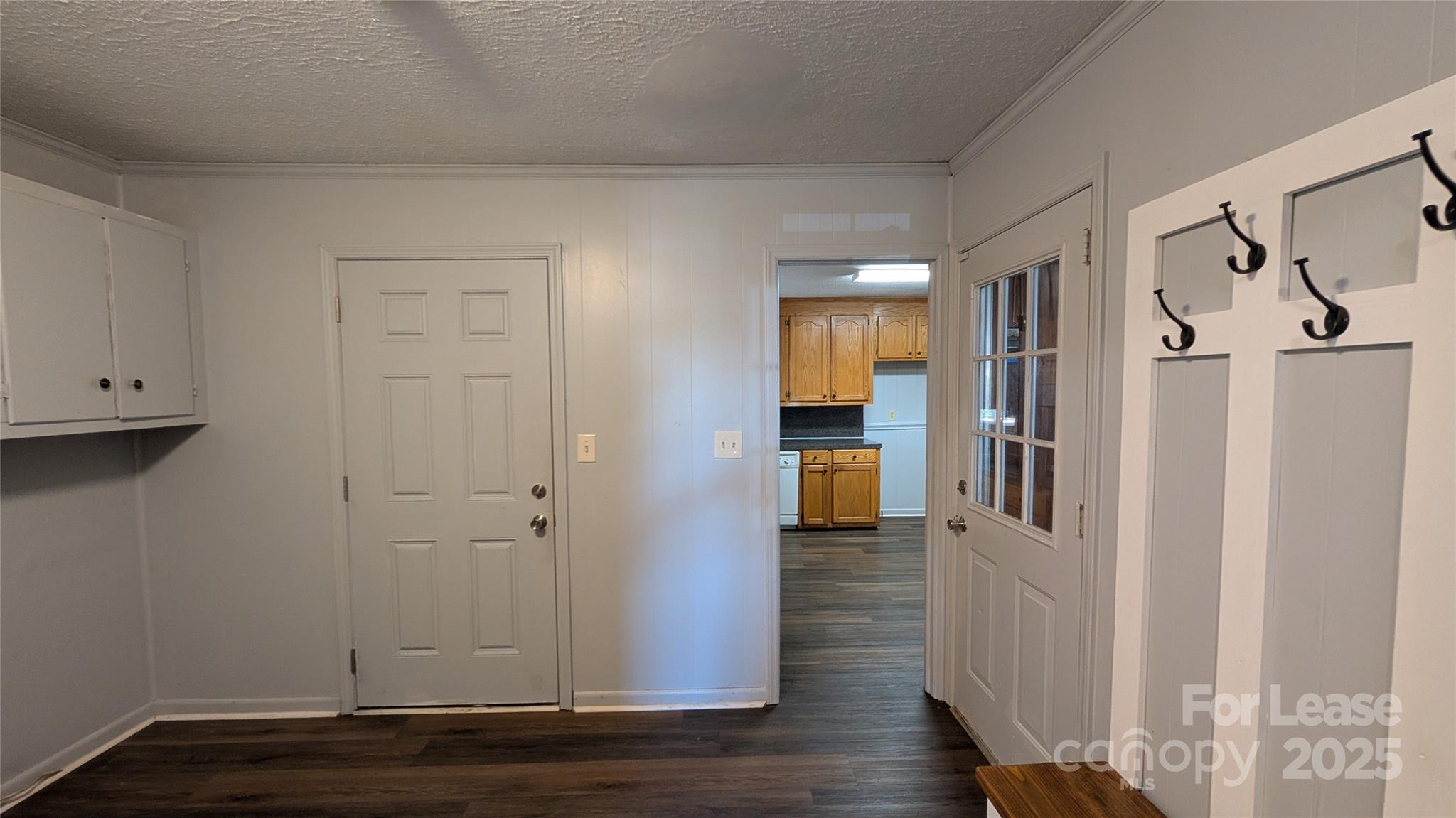 3889 Poplar Tent Road Concord, NC 28027 - Photo 28 of 33 a view of entryway with wooden floor