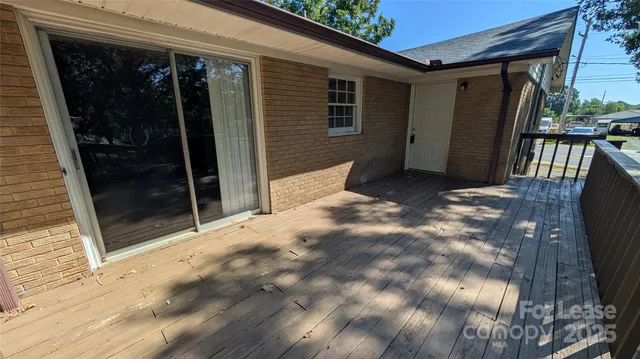 a view of backyard with porch