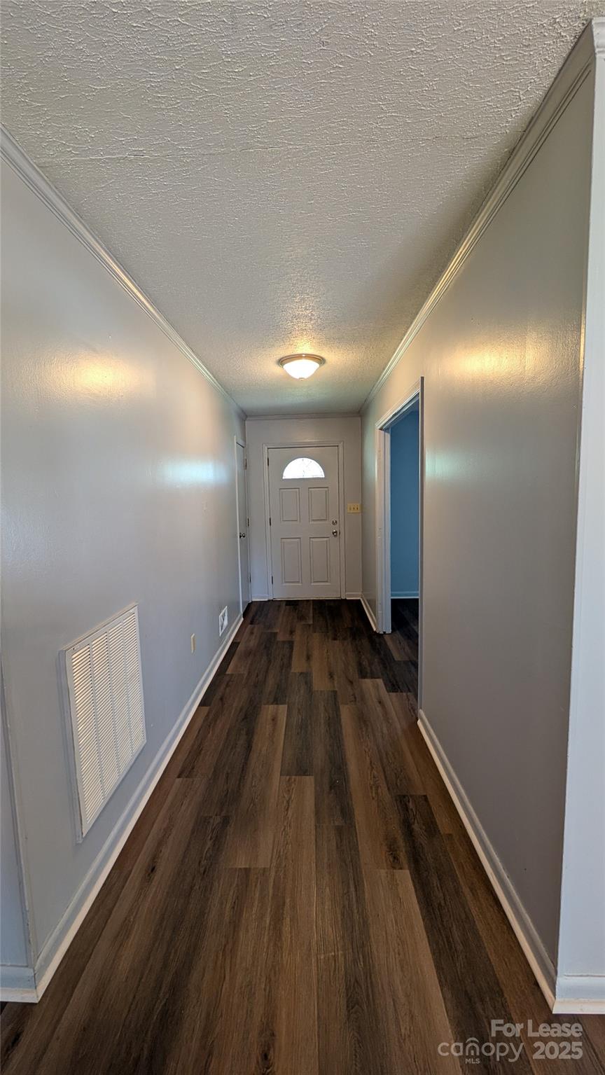 3889 Poplar Tent Road Concord, NC 28027 - Photo 4 of 33 a view of empty room with wooden floor