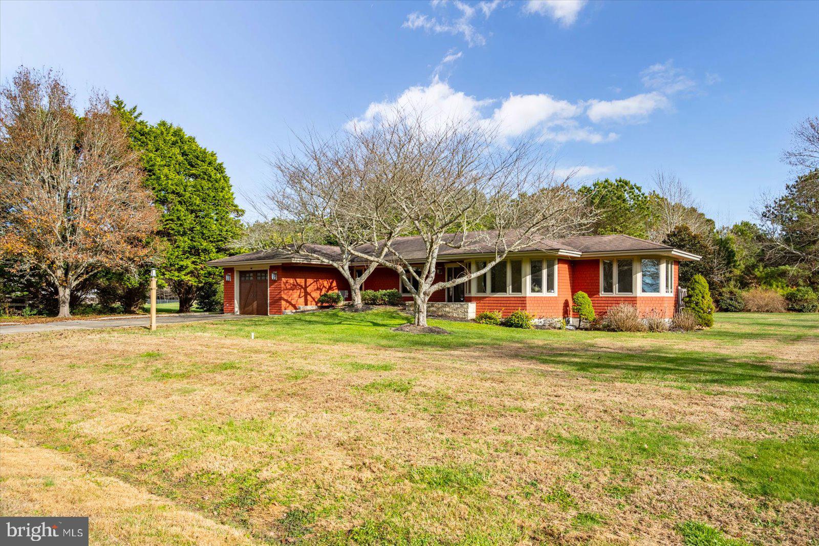 8814 Hunting Hound Road Berlin, MD 21811 - Photo 47 of 65 a front view of a house with a garden