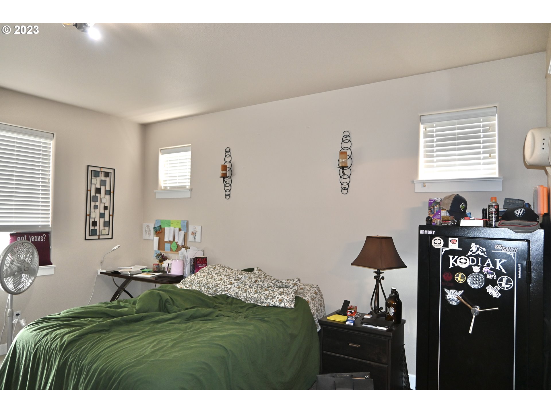 3623 Comiskey Street Forest Grove, OR 97116 - Photo 14 of 43 a bed room with a bed and a window