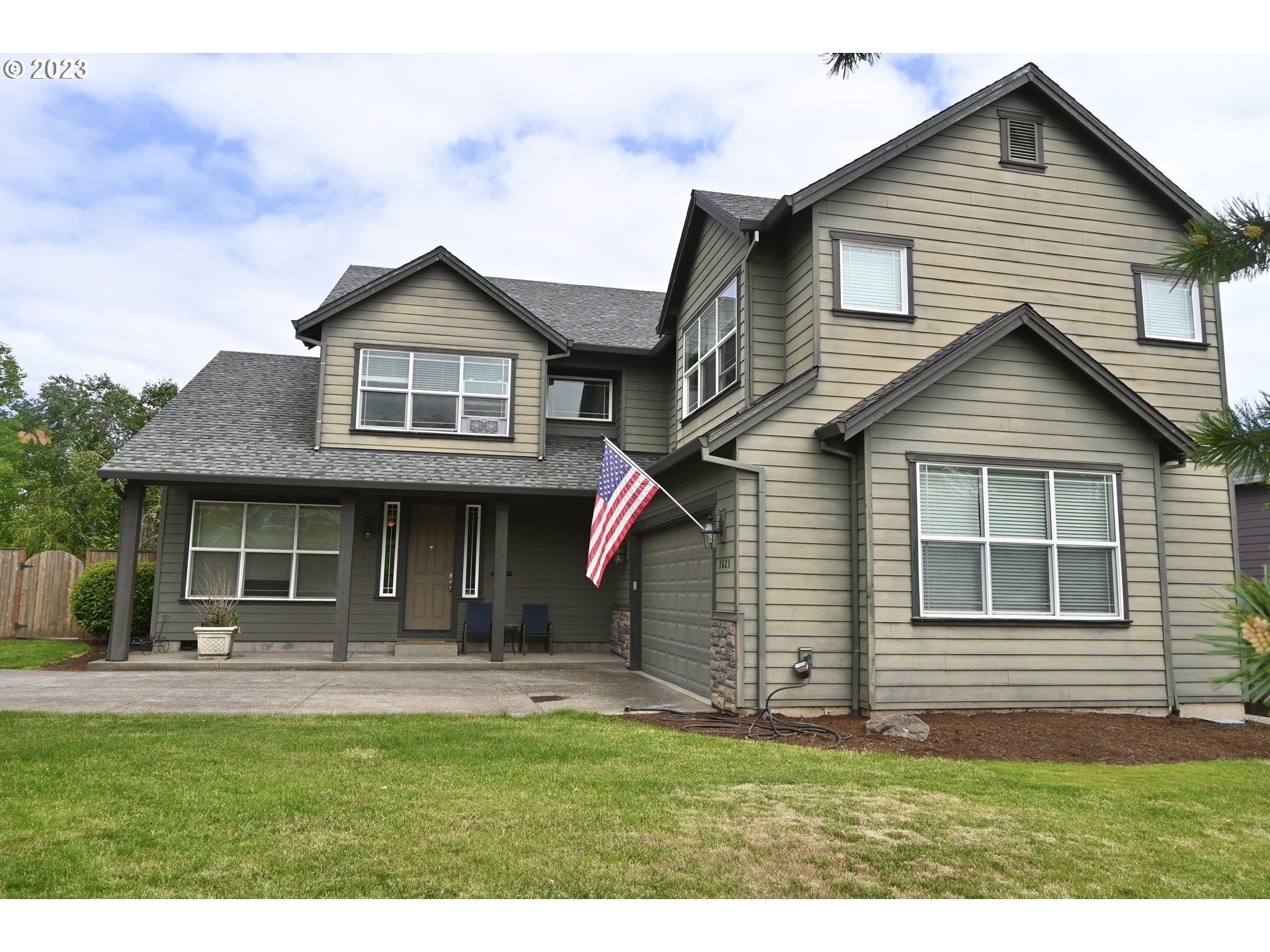 3623 Comiskey Street Forest Grove, OR 97116 - Photo 2 of 43 a front view of a house with a yard
