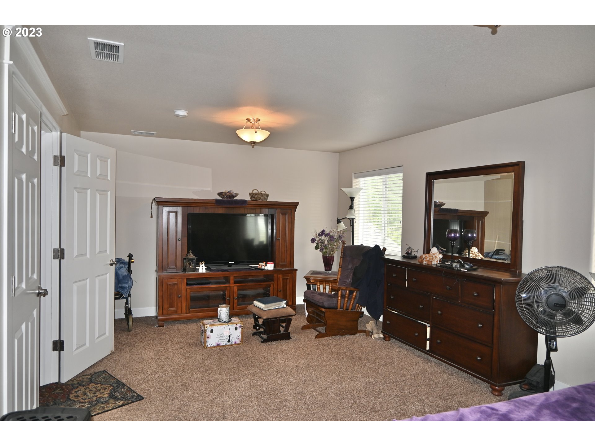 3623 Comiskey Street Forest Grove, OR 97116 - Photo 21 of 43 a living room with furniture and a flat screen tv