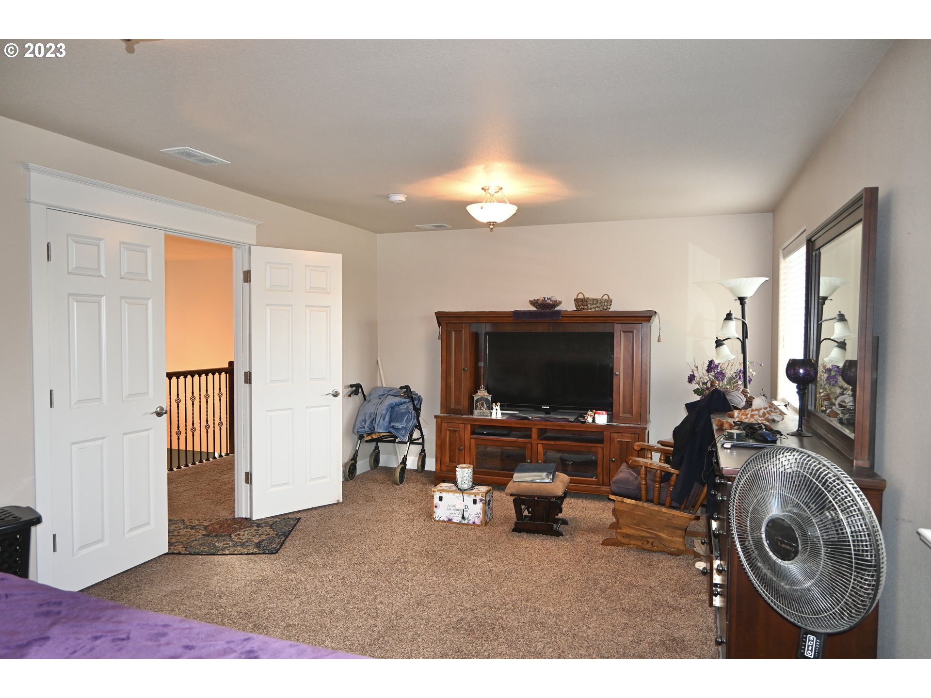 3623 Comiskey Street Forest Grove, OR 97116 - Photo 22 of 43 a living room with furniture and a flat screen tv