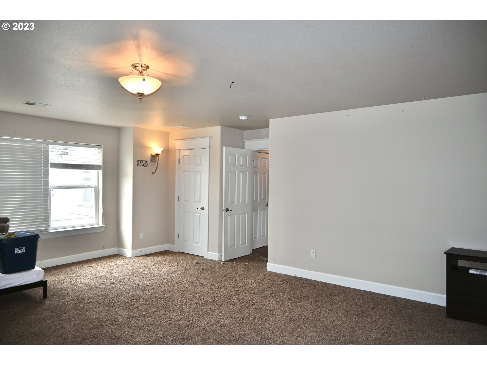 3623 Comiskey Street Forest Grove, OR 97116 - Photo 28 of 43 a view of an empty room with a chandelier
