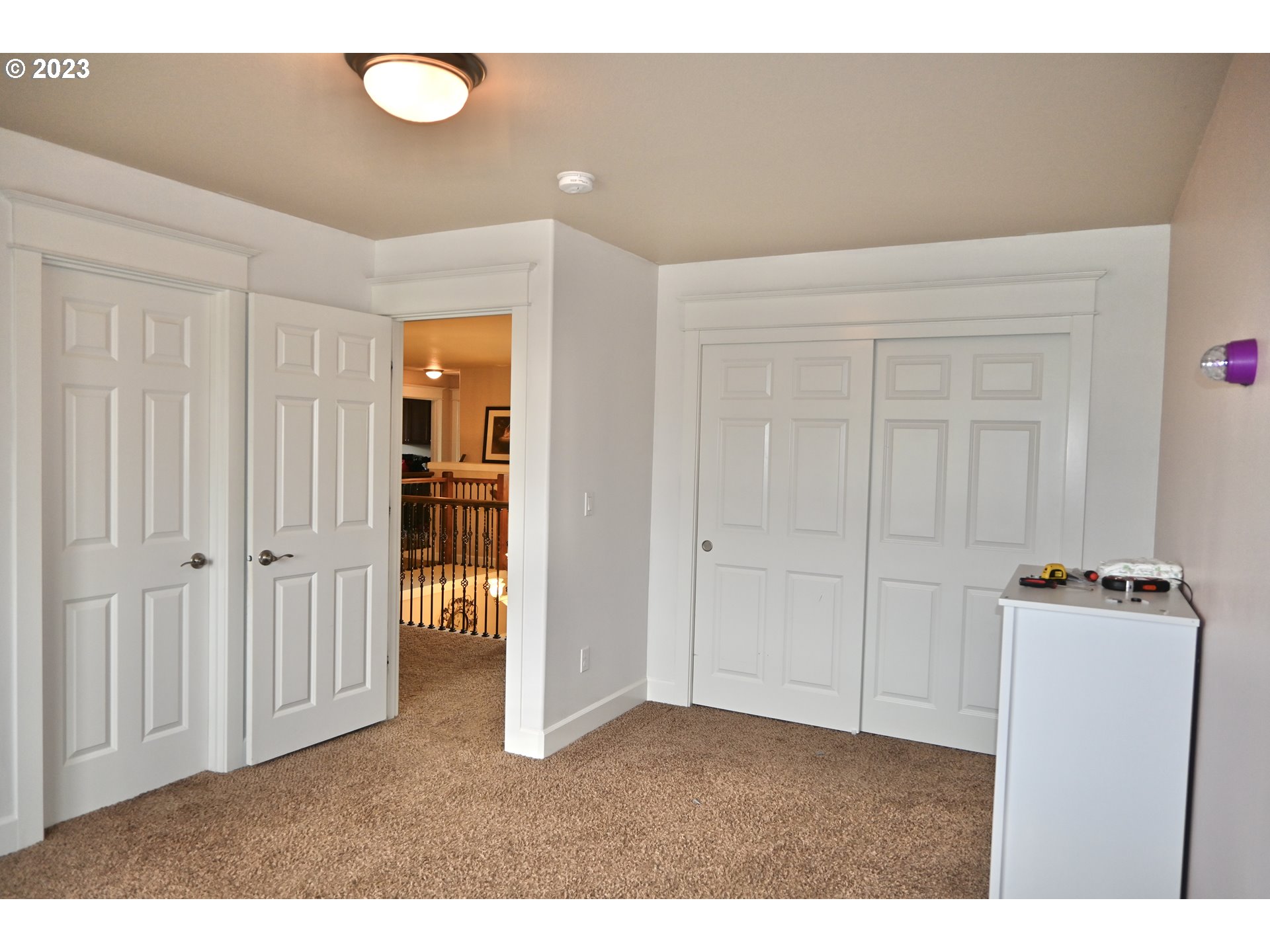 3623 Comiskey Street Forest Grove, OR 97116 - Photo 32 of 43 a kitchen with white cabinets and refrigerator