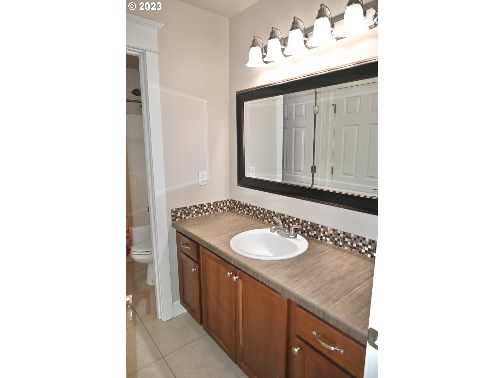 3623 Comiskey Street Forest Grove, OR 97116 - Photo 34 of 43 a bathroom with a sink and a mirror