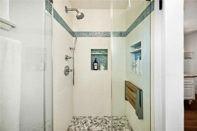 a kitchen with sink stove and refrigerator