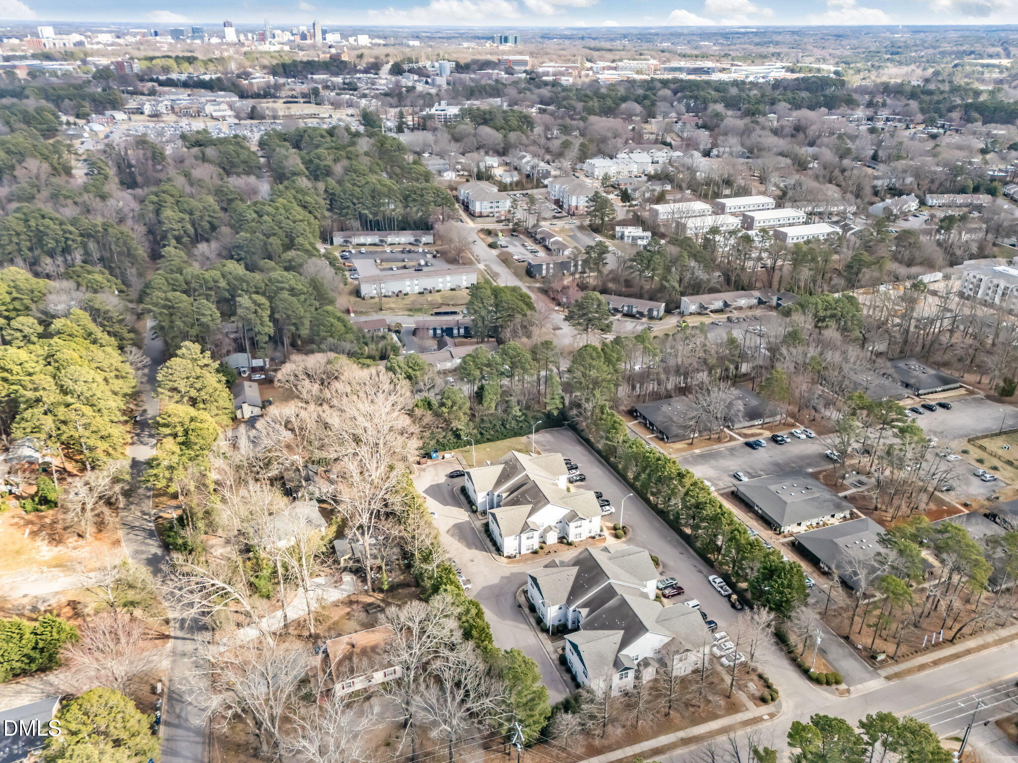 1305 Kent Road, Unit 101 Raleigh, NC 27606 - Photo 26 of 29 an aerial view of residential houses with outdoor space