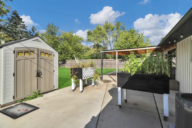 a garden view with a seating space
