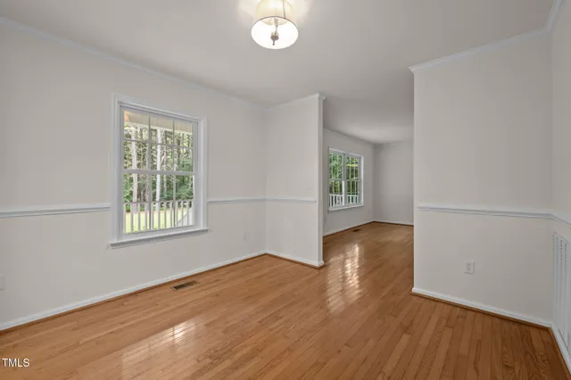 a kitchen with stainless steel appliances granite countertop a stove microwave and sink