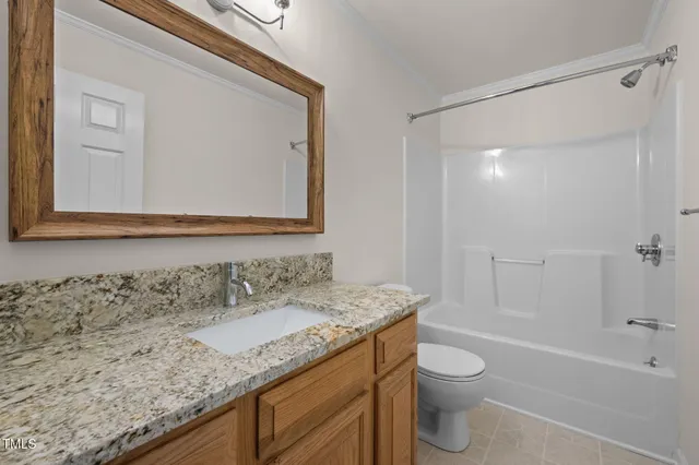 a view of a house with a big yard