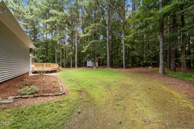 a house view with a garden space