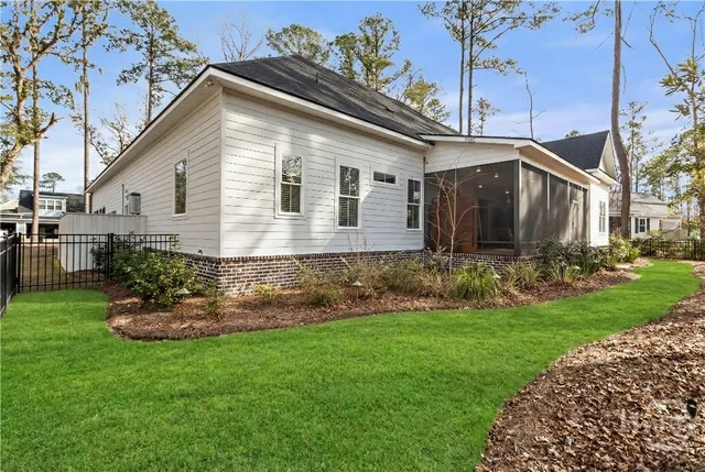 $949,000 | 542 Linkside Lake Drive, Richmond Hill, GA 31324