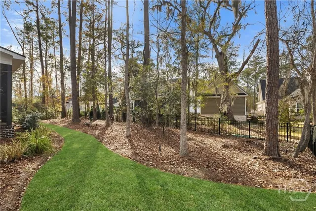 $949,000 | 542 Linkside Lake Drive, Richmond Hill, GA 31324