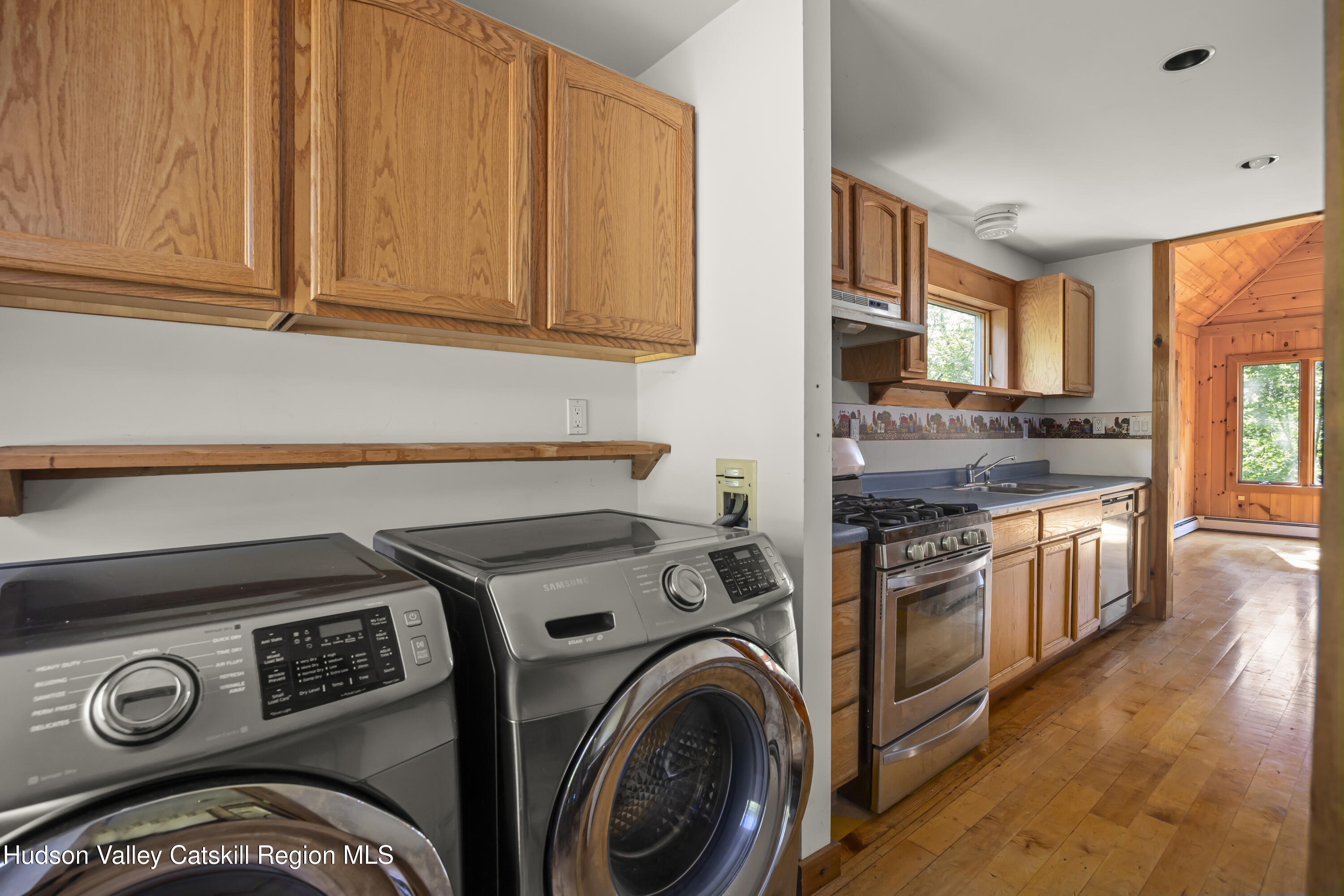 117 Spring Street Craryville, NY 12521 - Photo 13 of 31 a view of a kitchen with stainless steel appliances granite countertop a stove and a sink