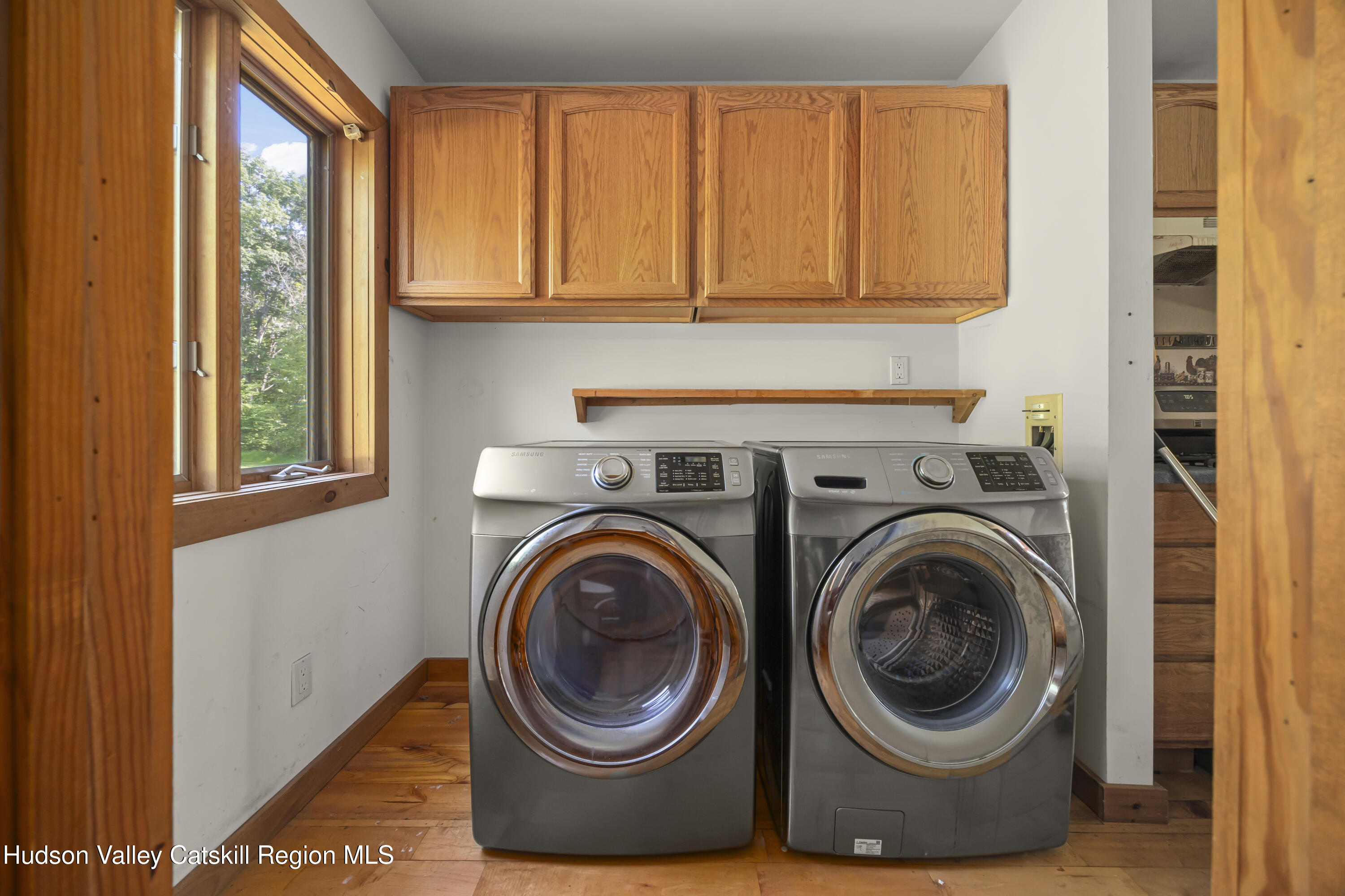 117 Spring Street Craryville, NY 12521 - Photo 15 of 31 a close up view of a washer and dryer next to a window