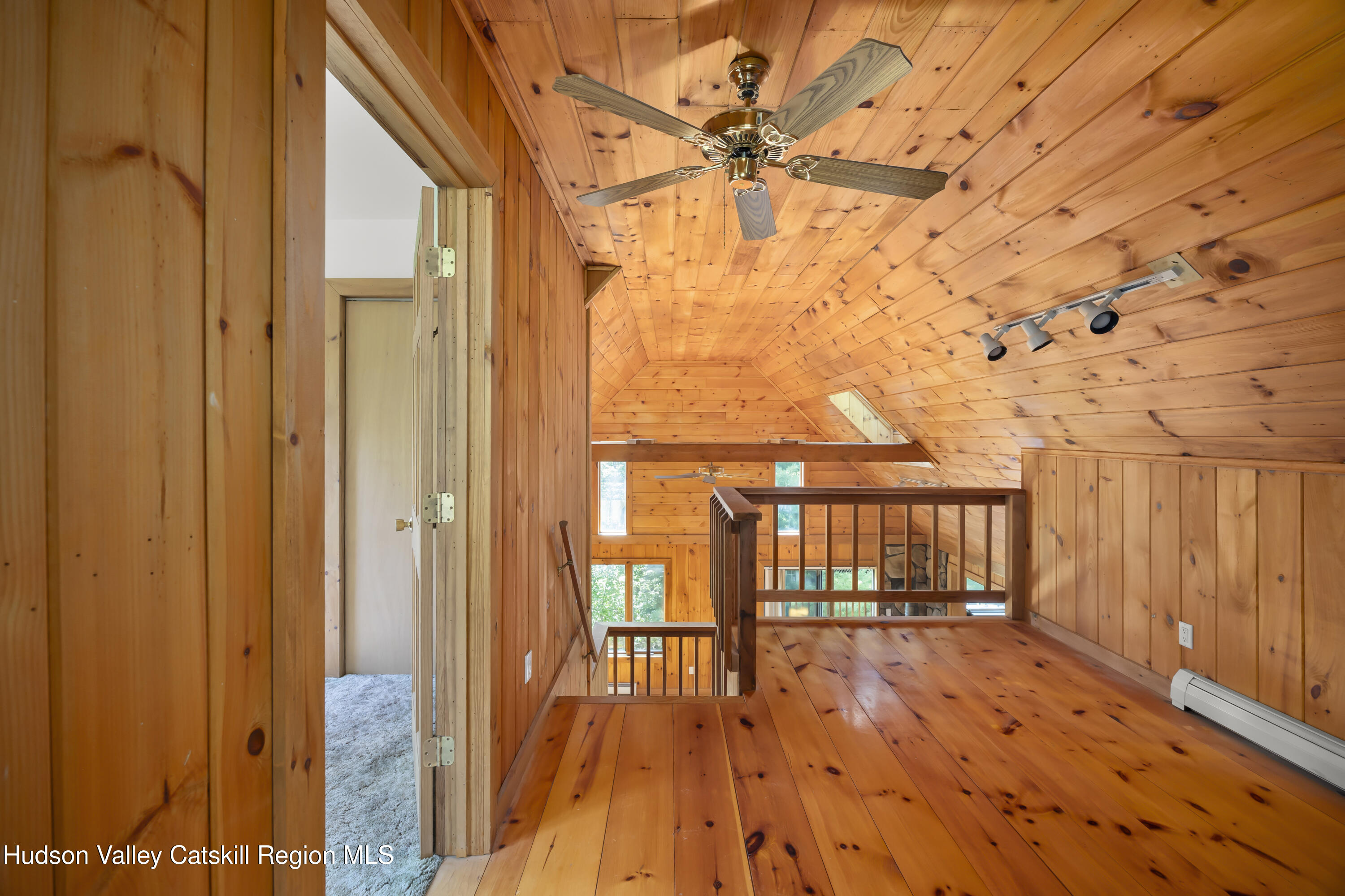 117 Spring Street Craryville, NY 12521 - Photo 20 of 31 a view of a balcony with wooden floor