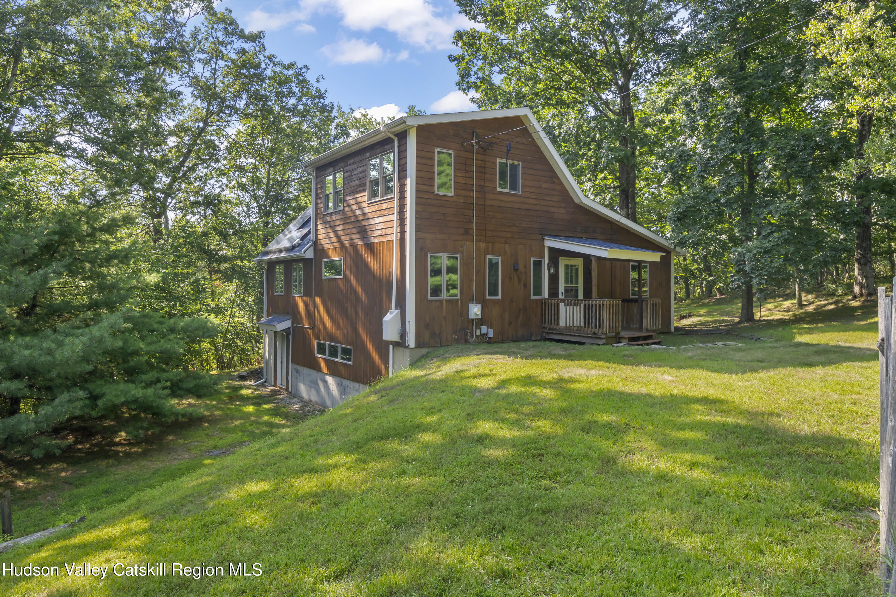 117 Spring Street Craryville, NY 12521 - Photo 30 of 31 a front view of a house with a garden